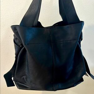 Vince Camino Black LeatherTote and 
shoulder. Has knots on each side.Very soft.
